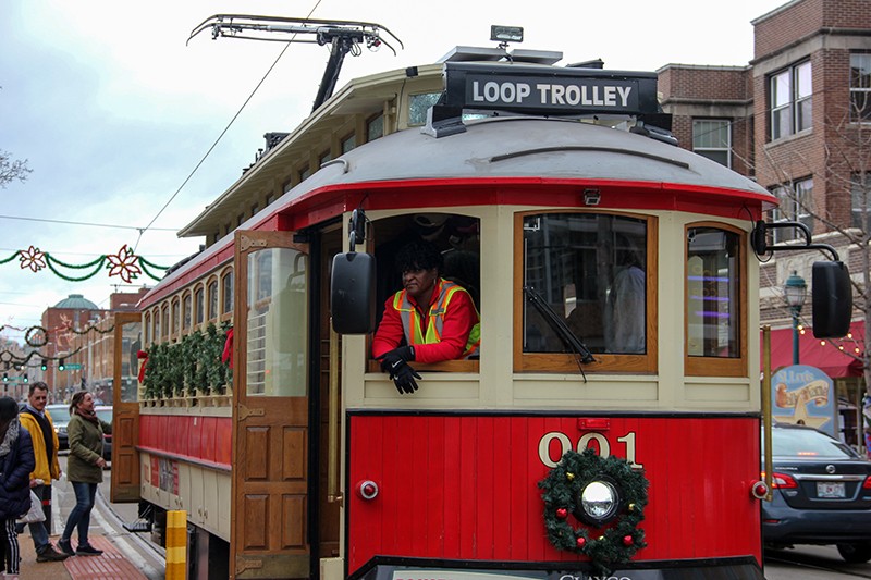 A worker on a packed Delmar Trolley on Sunday. - DANNY WICENTOWSKI