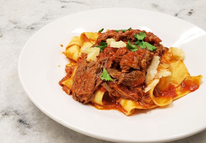 The pappardelle pasta is made with braised beef, tomato ragu and pecorino-romano cheese. - KRISTEN FARRAH