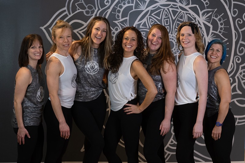 The team at Detox Yoga posed for a photo before social distancing went into place. - COURTESY APRIL ELLIOTT