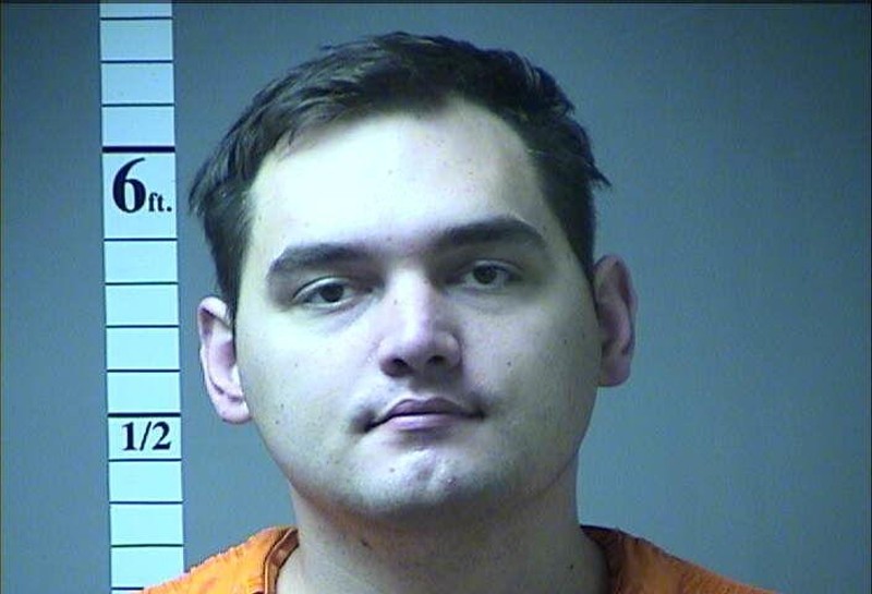 Cameron Swoboda was outed by his friends for planning a large-scale attack, police say. - MUGSHOT
