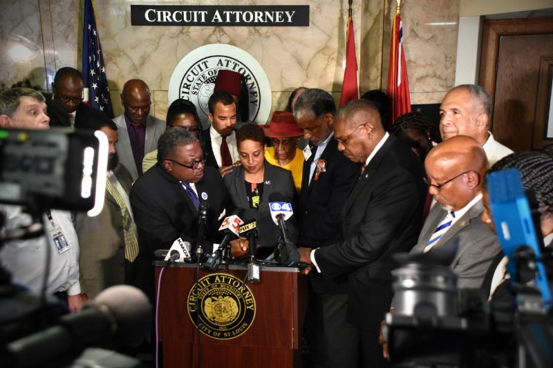Supporters pray over St. Louis Circuit Attorney Kim Gardner in July 2019. - DOYLE MURPHY