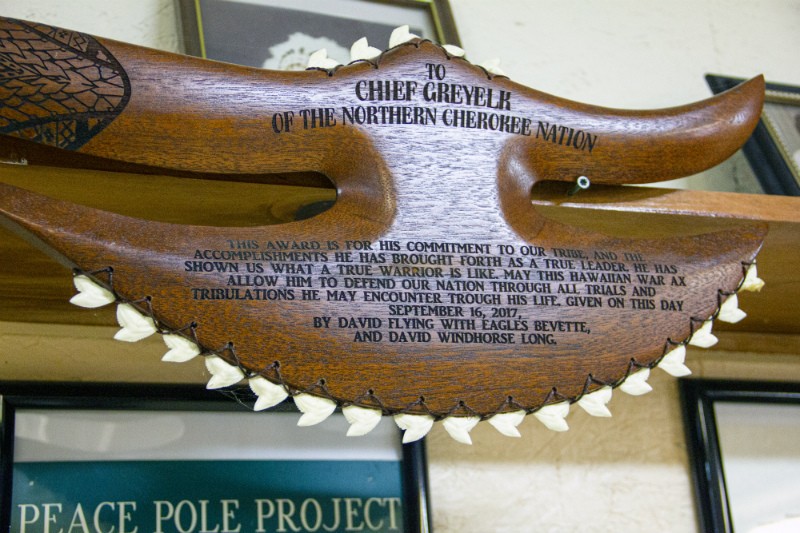 The Northern Cherokee Nation's headquarters are filled with artifacts (like this "Hawaiian War Ax")  and other items that ostensibly support its identity as a Native American tribe. - DANNY WICENTOWSKI