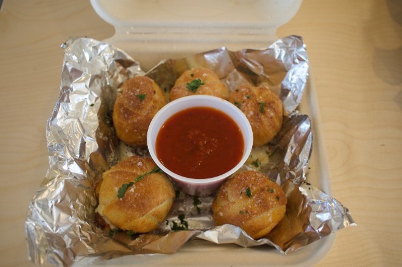 The cheese-filled garlic knots are sure to be a crowd pleaser. - CHERYL BAEHR