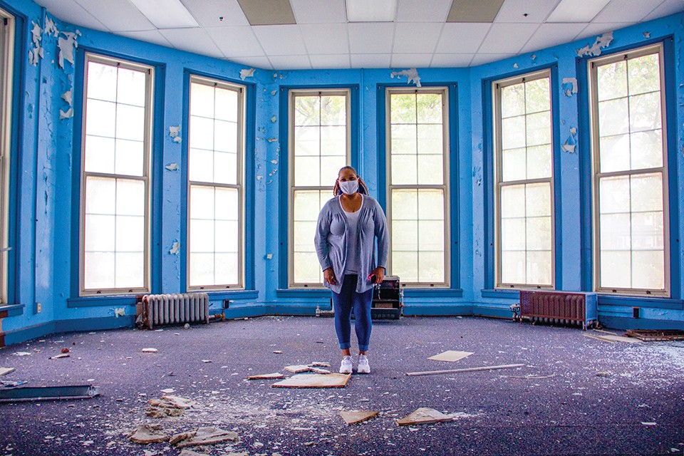 18th Ward Democratic Committeewoman Yolonda Yancie stands in what remains of her old kindergarten room in Euclid School in Fountain Park. - DANNY WICENTOWSKI