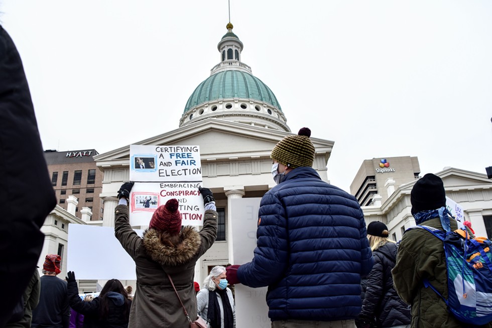 Protesters call for Josh Hawley's resignation during a demonstration on Jan. 9 in St. Louis. - DOYLE MURPHY