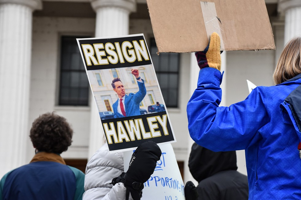 A photo of Hawley saluting Trump supporters is in heavy use by his critics. - DOYLE MURPHY