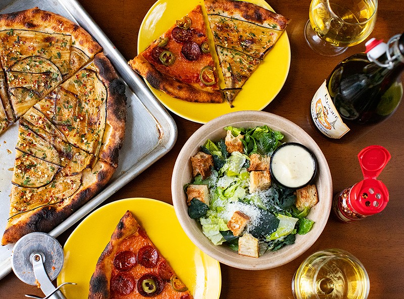Bonci and pepperoni pizzas with Caesar salad. - MABEL SUEN