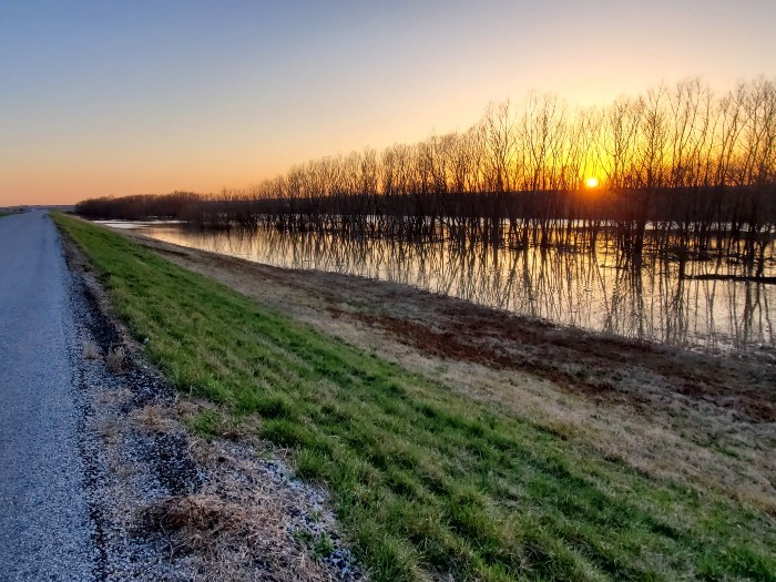 Sunset on the levee road in Illinois. - COURTESY MARK FINGERHUT