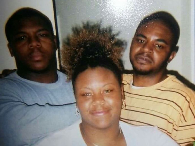 Robert Franklin (right), his mother, Dina, and younger brother. - COURTESY OF DINA FRANKLIN