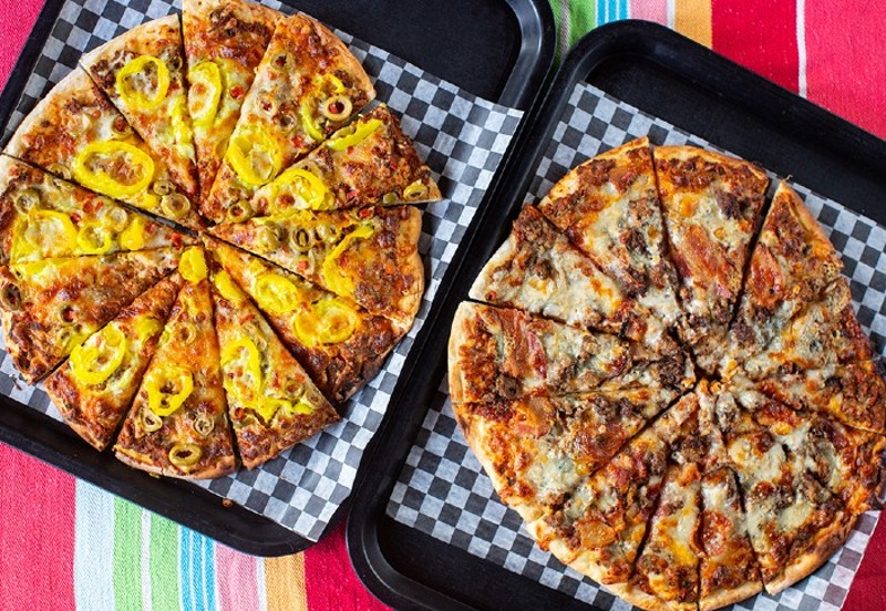 The two owners' personal favorite pizzas: Kimbo pizza and Rossmonster pizza. - MABEL SUEN