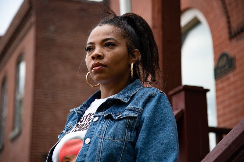 Monisha Merrill, sister of Cortez Bufford, poses for a portrait at the Bufford home on May 16, 2021, in St. Louis. - MICHAEL B. THOMAS FOR THE INTERCEPT