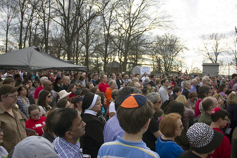 An interfaith crowd gathered for a vigil at the conclusion of the day's cleanup efforts. - Photo by Danny Wicentowski
