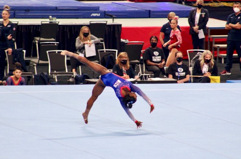 Simone Biles, the most highly decorated American gymnast, completes her floor routine at Friday's Olympic trials. - ZOE BUTLER