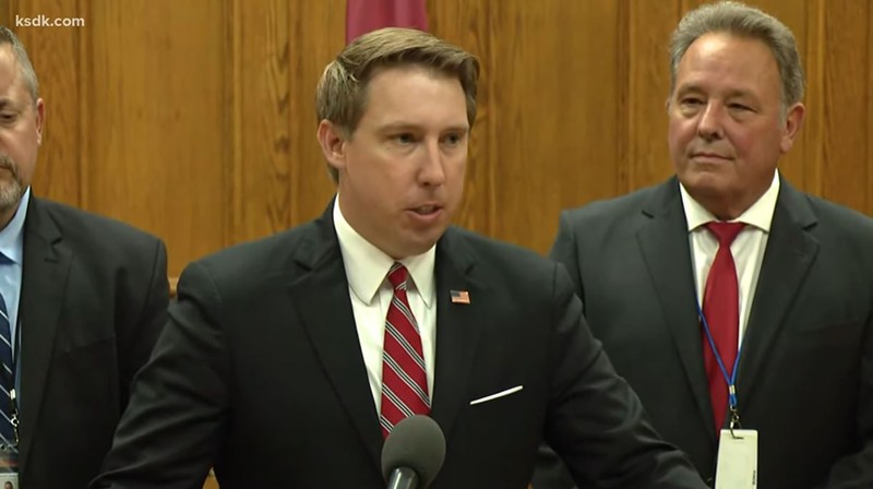 Lincoln County Prosecuting Attorney Michael Wood announcing a murder charge against Pam Hupp. - SCREENSHOT VIA KSDK