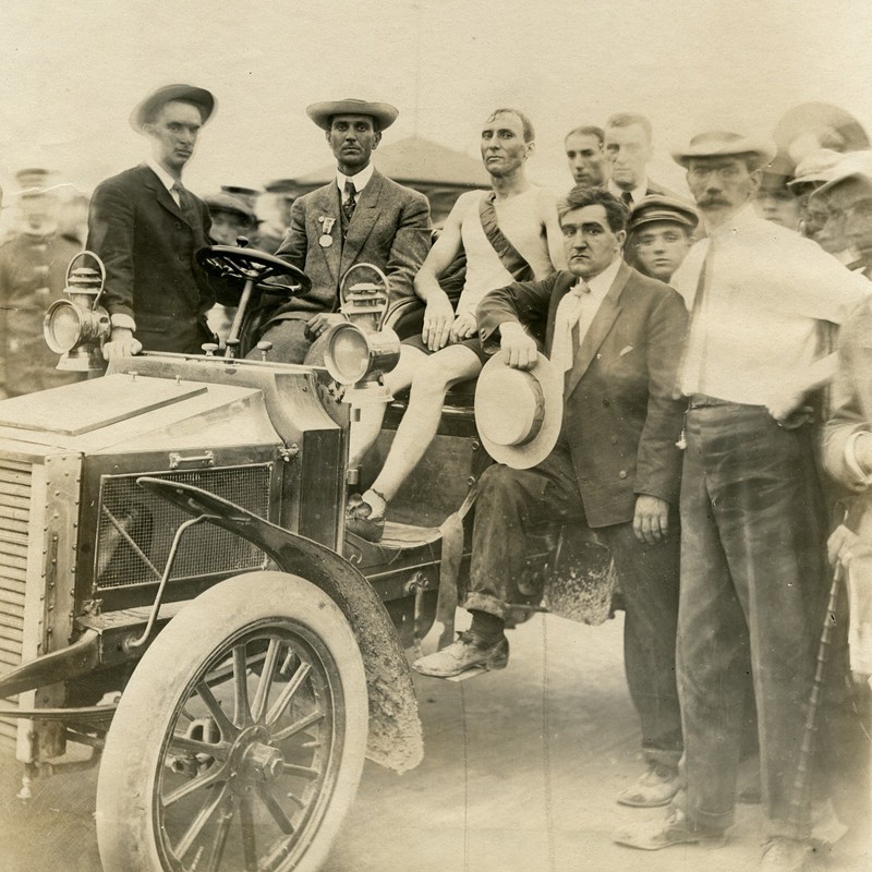 Hicks seated in a car after being declared the winner of the race. - COURTESY MISSOURI HISTORICAL SOCIETY