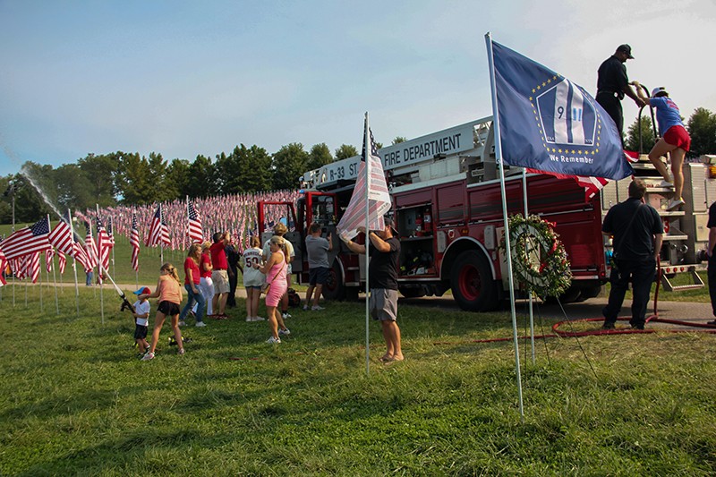 St. Louis Fire Department trucks were on-site for the "Flags of Valor" memorial on Art Hill this week. - DANNY WICENTOWKSI