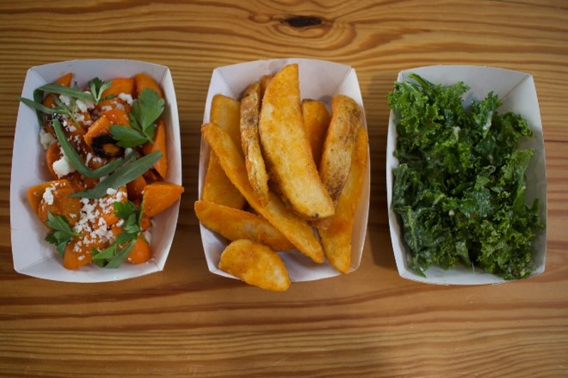 Chicken Scratch sides include seasonal vegetables, jojo potatoes and dressed kale. - CHERYL BAEHR
