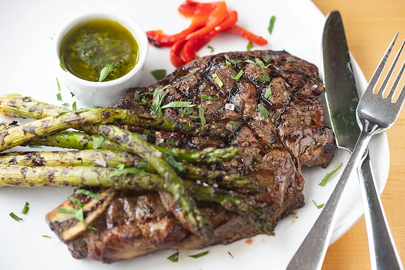 Bone-in ribeye with asparagus. - MABEL SUEN