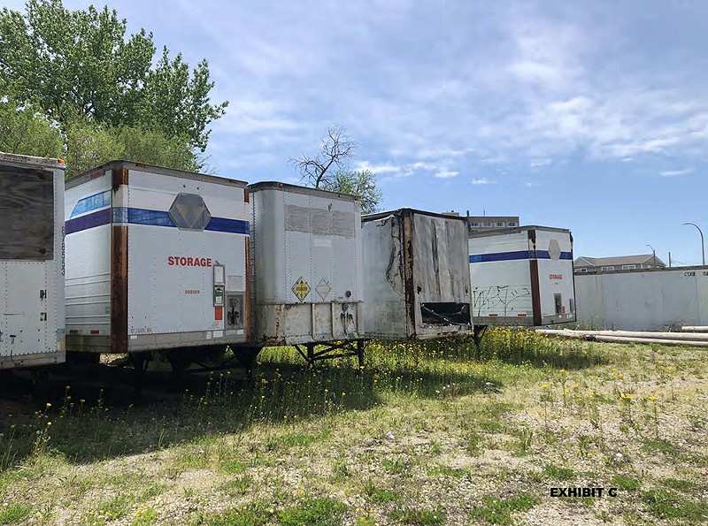 The Hyde Park Neighborhood Association alleges unsecured trailers at 2106 Destrehan Street, one of 11 properties involved in the suit, encourage criminal activity. - Stinson LLP