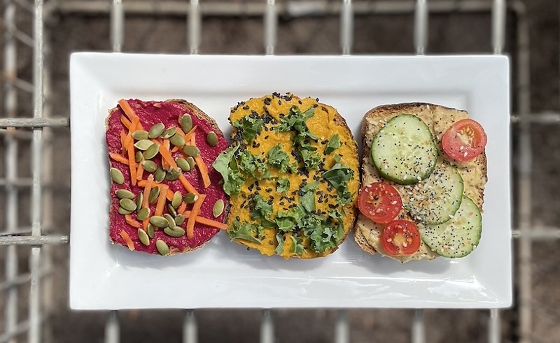 Three varieties of hummus toast from Maypop are just some of the dishes available during St. Louis Plant-Based Restaurant Week. - COURTESY OF MAYPOP