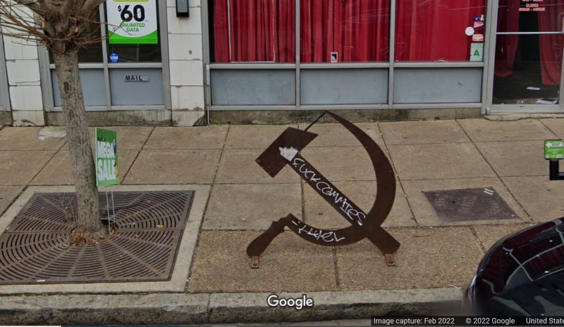 The Hammer and Sickle Bike Rack was located in front of the former Propaganda Bar. - Google Street View