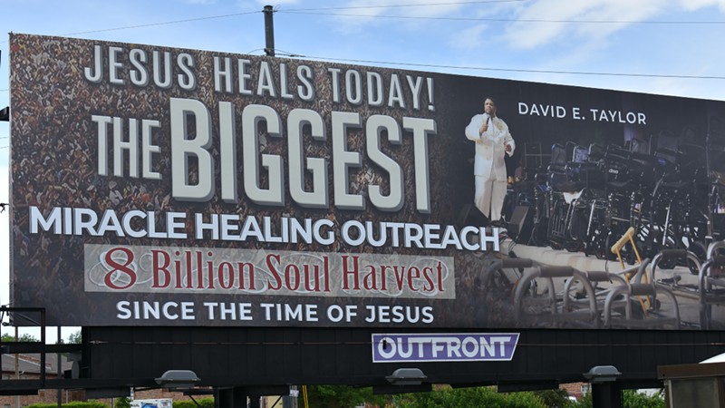 Billboard featuring David E. Taylor, who runs both the Kingdom of God Global Church as well as Joshua Media Ministries International. - Ryan Krull