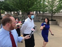 Anthony Weaver leaving federal court today, where he pled not guilty. - RYAN KRULL
