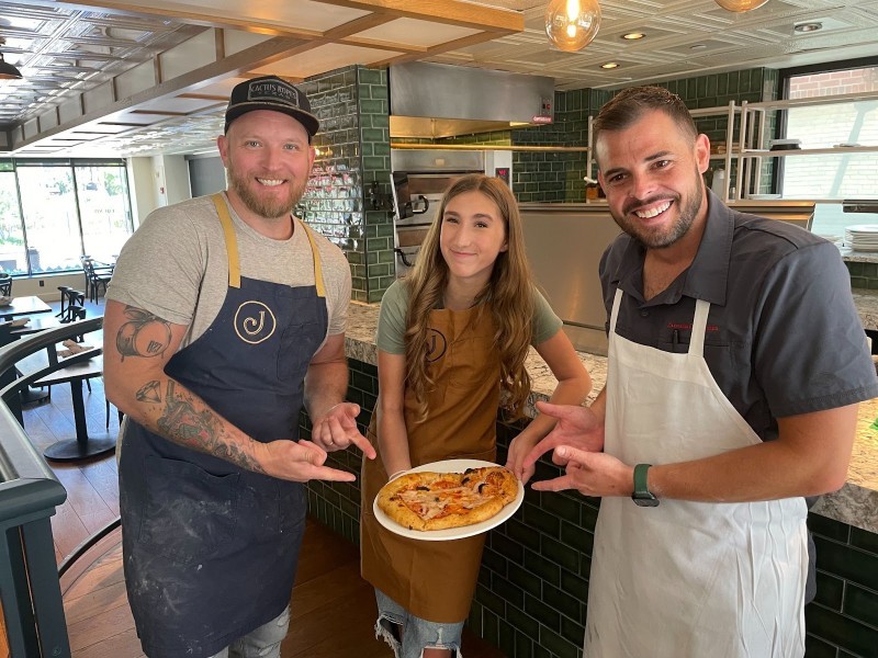 Juniper's Daniel Poss, his daughter Jayla, and Edera's Andrew Simon show off their creation. - Courtesy of Edera Italian Eatery