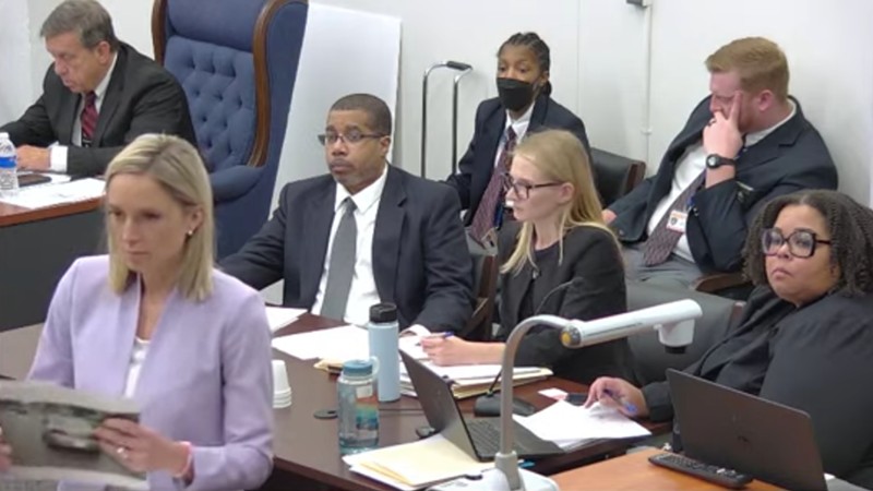 This week, a jury will have to decide if Dawan Ferguson (center) is guilty of child abuse and killing his nine-year-old son Christian in 2003. - St. Louis County Circuit Attorney's Office Live Stream