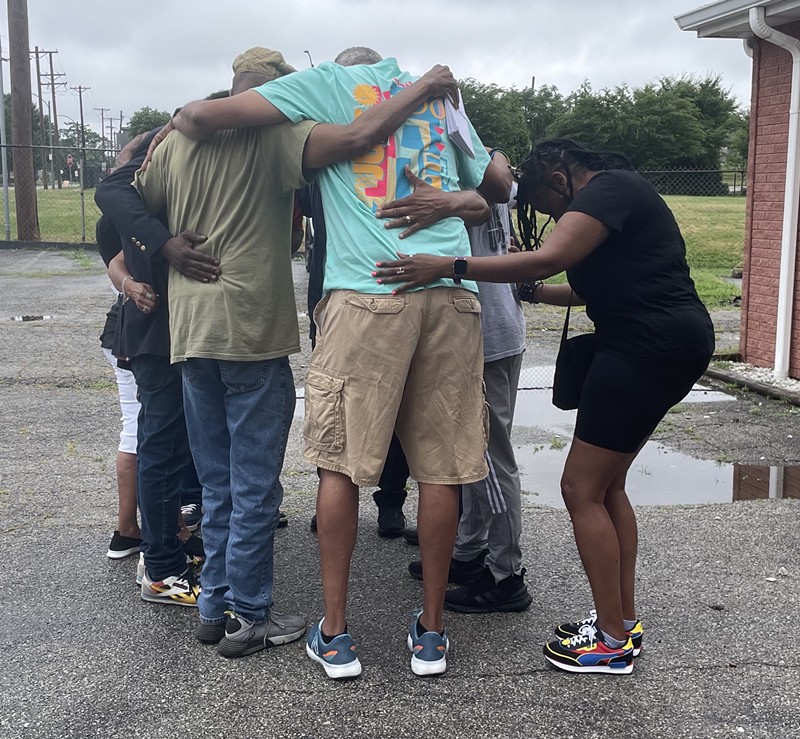 A prayer circle was held at the Thessalonian Missionary Baptist Church before handing out fliers about the Grand Motel to citizens in Jeff-Vander-Lou. - BENJAMIN SIMON