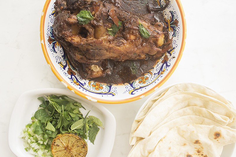 The stout-braised oxtail comes with griddled piadina, a sort of large Italian tortilla. - PHOTO BY MABEL SUEN