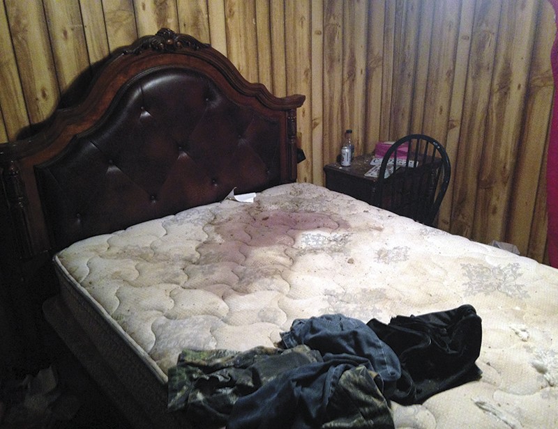 Investigators found a blood-soaked mattress in the Anconas' bedroom. - PHOTO BY DOYLE MURPHY
