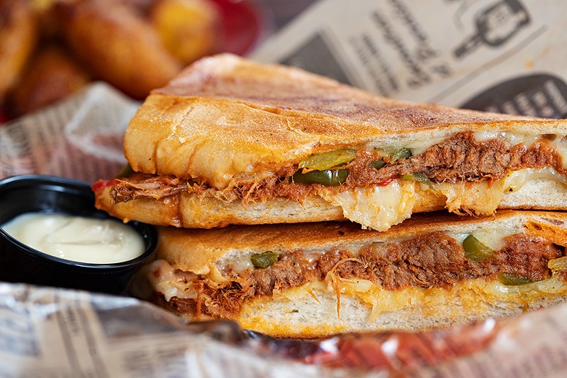 The ropa vieja sandwich includes shredded beef and Swiss cheese. - Mabel Suen