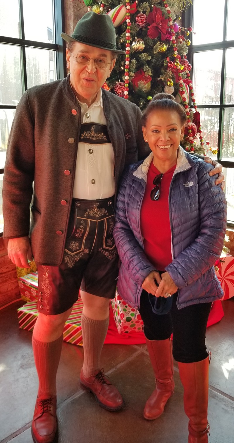 Neil and Veronica Putz take a break from the parlor tours one year to snap a photo. Neil, whose family is from Austria, says likes to dress up in Austrian-German clothes for the tours. - VIA NEIL AND VERONICA PUTZ
