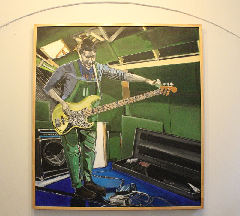 A painting of Anne Tkach tuning her bass.