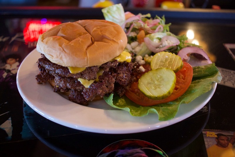 The Big Foot features four smashed burger patties, four slices of American cheese and deep fried garlic mayo.