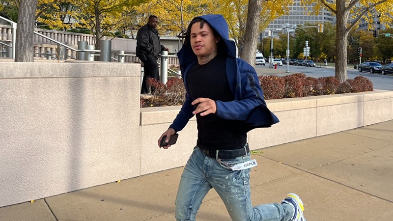Arthur Pressley, better known as 30 Deep Grimeyy, jogging into the federal courthouse downtown . - Ryan Krull