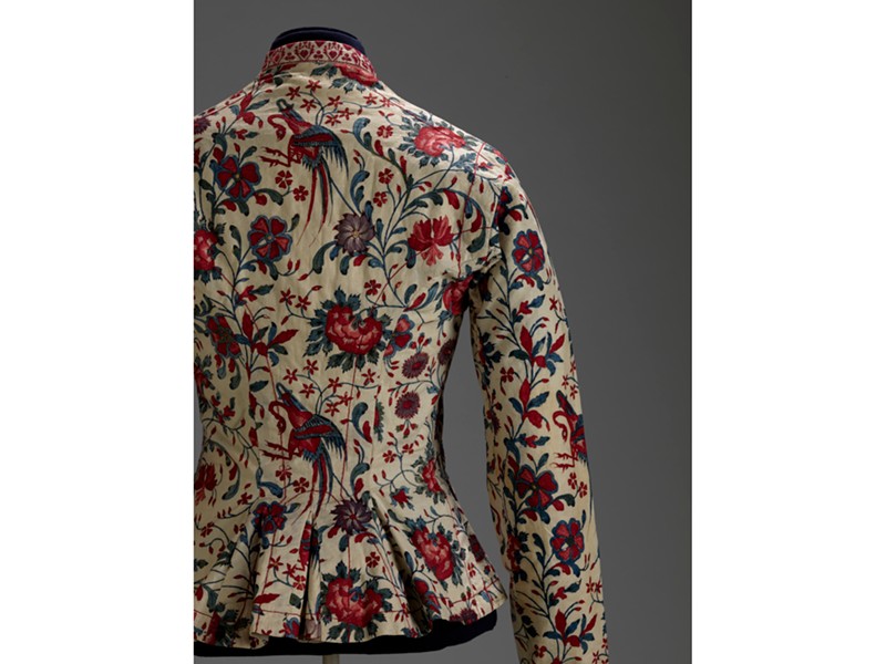 The back of a woman's jacket made with Indian chintz fabric.