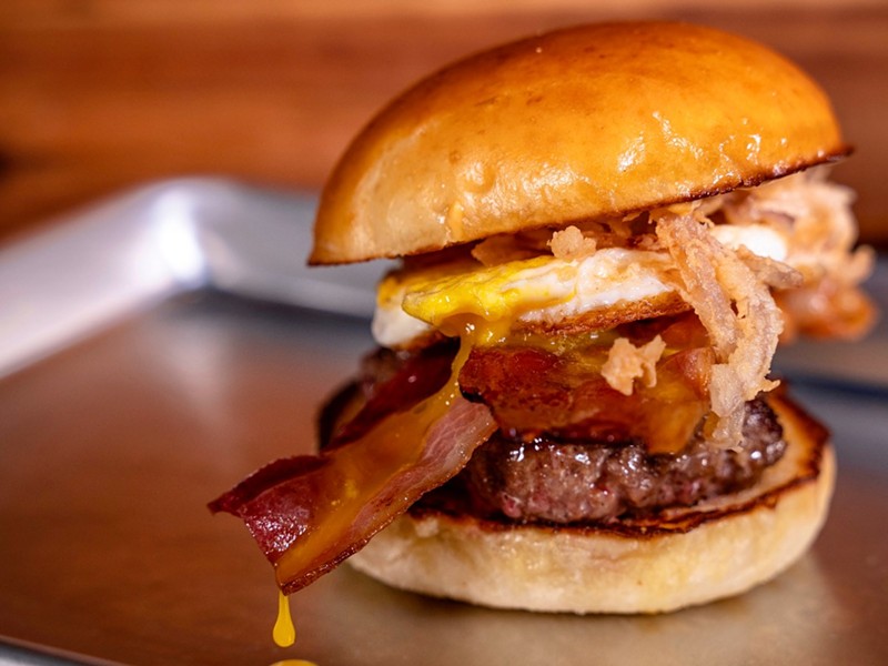 A burger with bacon and an fried egg. - Courtesy of the Armory St. Louis