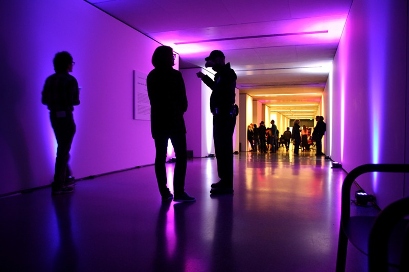 Visitors enjoy a late night event at Saint Louis Art Museum.