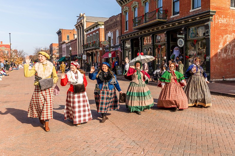 Characters from Christmas Traditions on St. Charles Historic Main Street.
