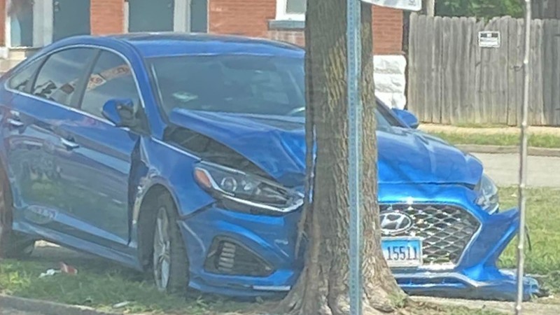 A Hyundai Sonata sits abandoned after being crashed into a tree in St. Louis city. - Courtesy Nic Reese
