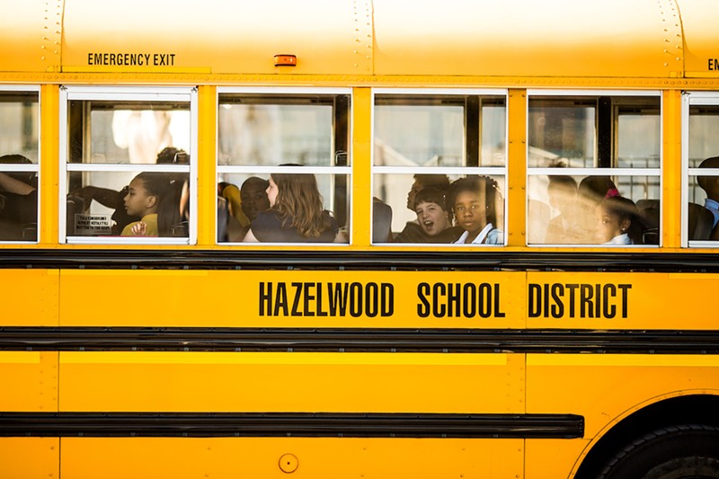 Students on a school bus in Hazelwood.