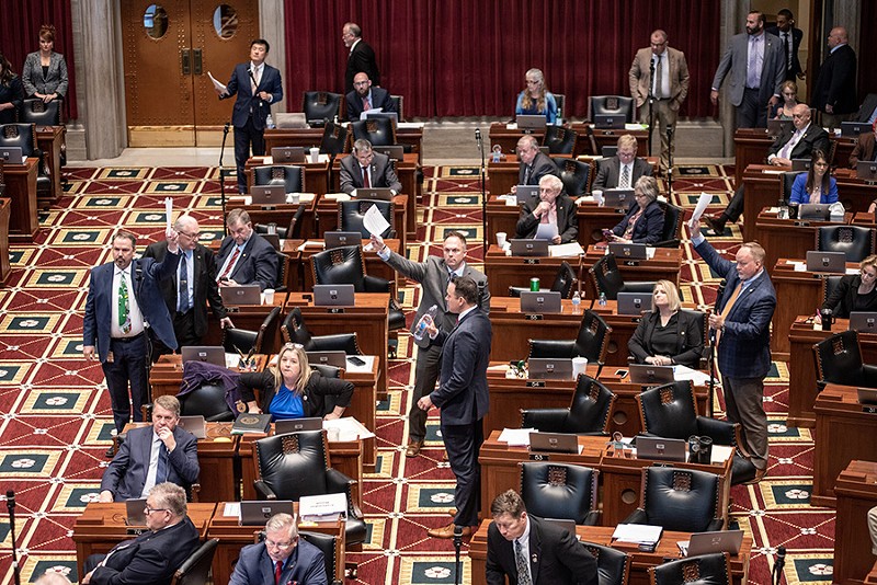 Missouri House Republicans raise their hands to speak on a ban for gender-affirming care for minors as House Majority Leader Jon Patterson, R-Lee's Summit, moves for a vote. - Annelise Hanshaw/Missouri Independent
