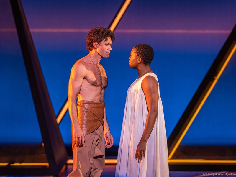 Wonu Ogunfowora (right) as Aida and Ace Young (left) as Radames fall in love in Aida.
