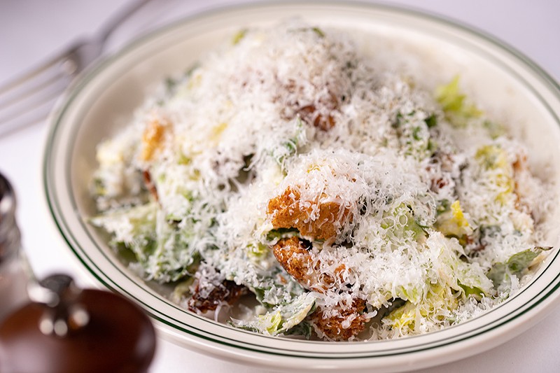 Wright's Tavern's Caesar is so covered in  Parmigiano-Reggiano you can't see the green of the leaves.