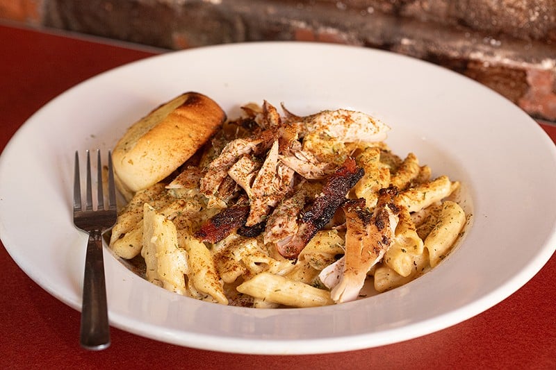 The Jerk Rasta Pasta includes chicken, onion, pepper and white sauce.