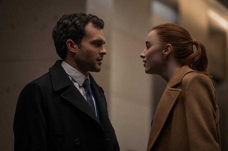 Luke (Alden Ehrenreich) and Emily (Phoebe Dynevor) are in love — but work is a complication. - COURTESY OF NETFLIX