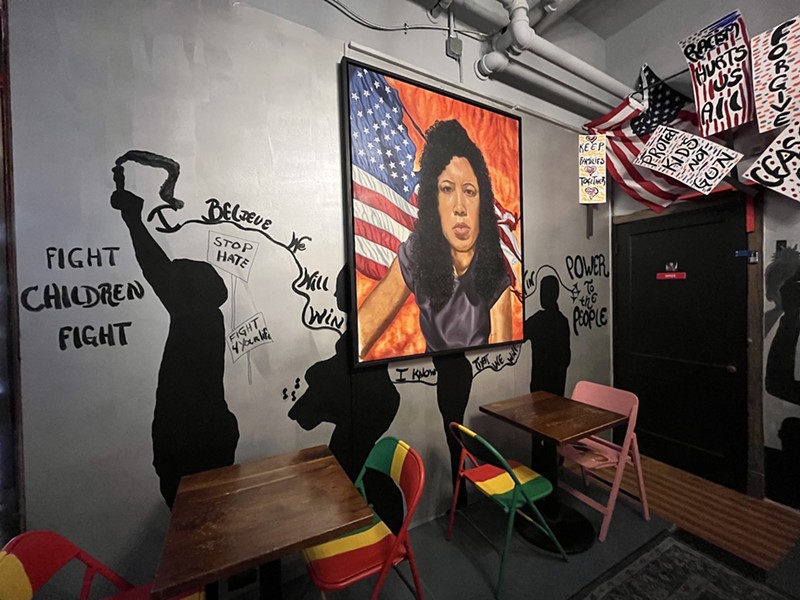 Artwork by many, including Baker's partner Elena Coby, lines the walls.