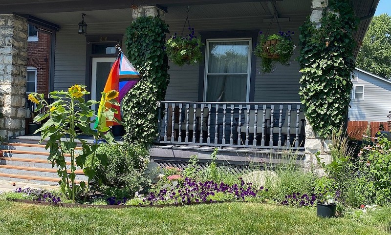 Alex and Kelly Pearson-Potts flew this flag on their porch in solidarity with LGBTQ neighbors. - COURTESY ALEX PEARSON-POTTS